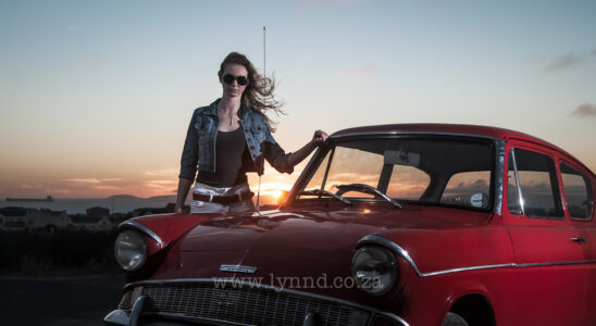 Commercial photography with Riana with Vintage car at sunset